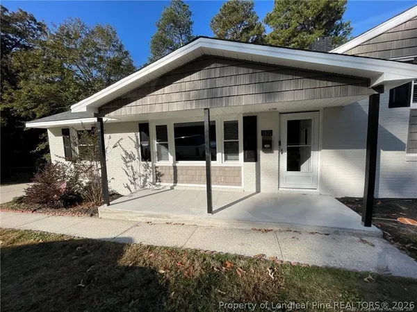 a view of a house with patio