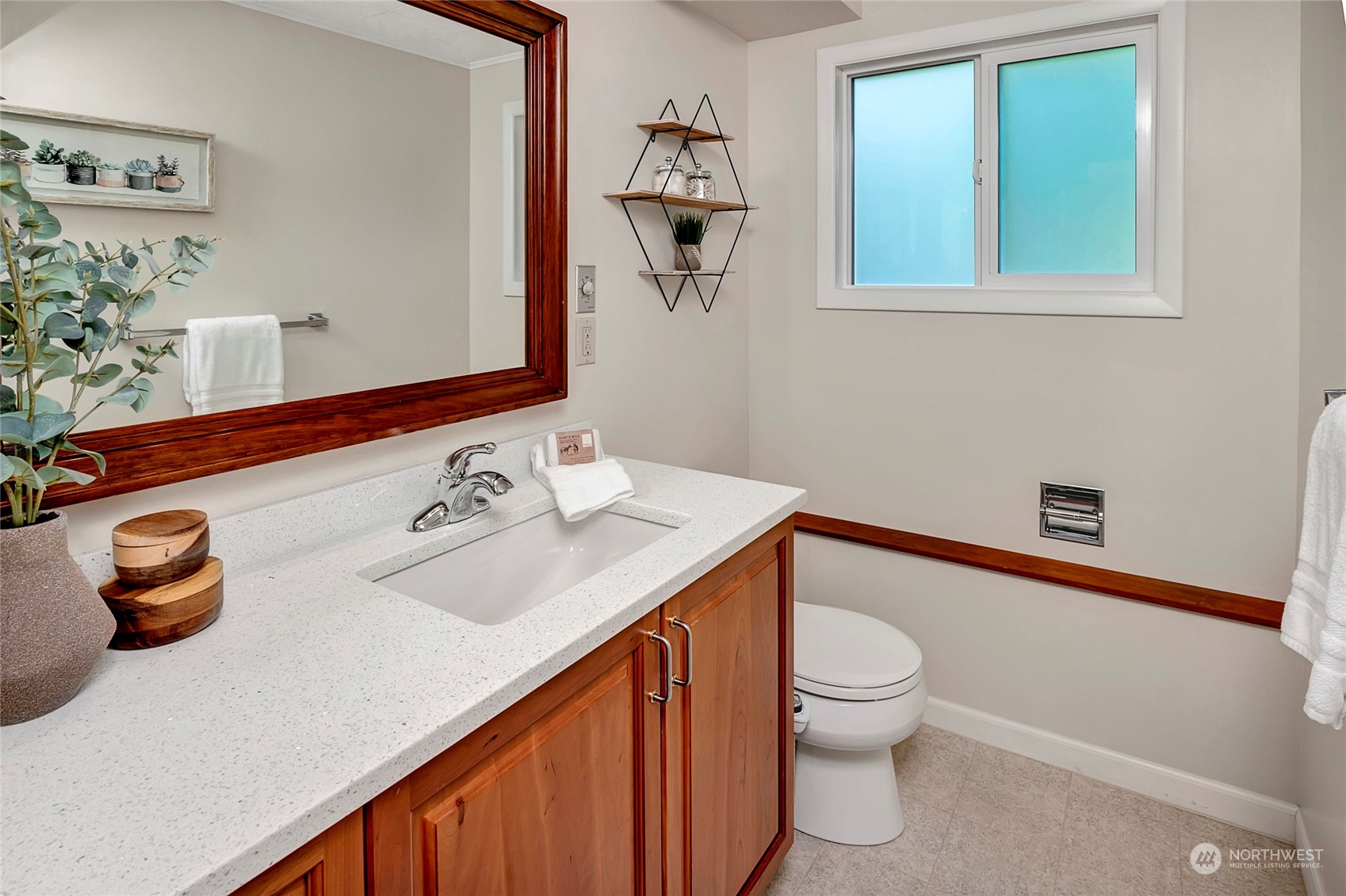 3405 197th Place Southeast Bothell, WA 98012 - Photo 16 of 17 a bathroom with a sink a toilet and a mirror