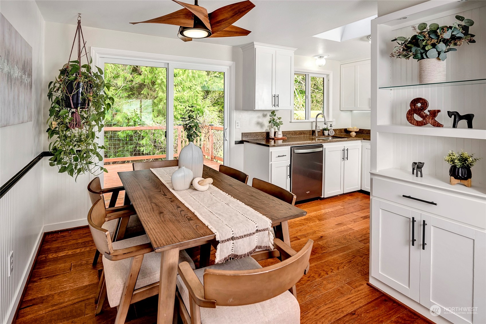 3405 197th Place Southeast Bothell, WA 98012 - Photo 3 of 17 a kitchen with a table chairs and a window