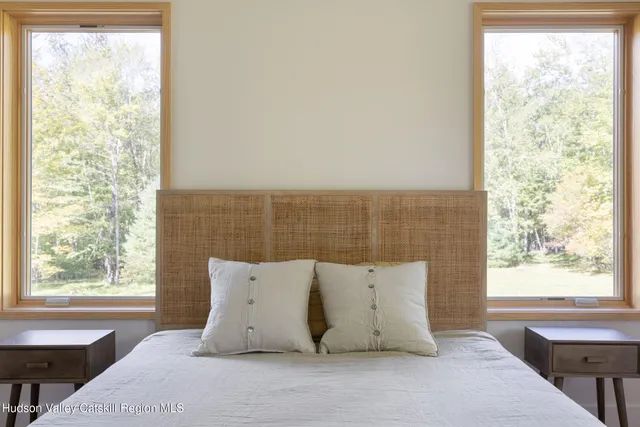 a bathroom with a granite countertop sink a toilet and a bathtub