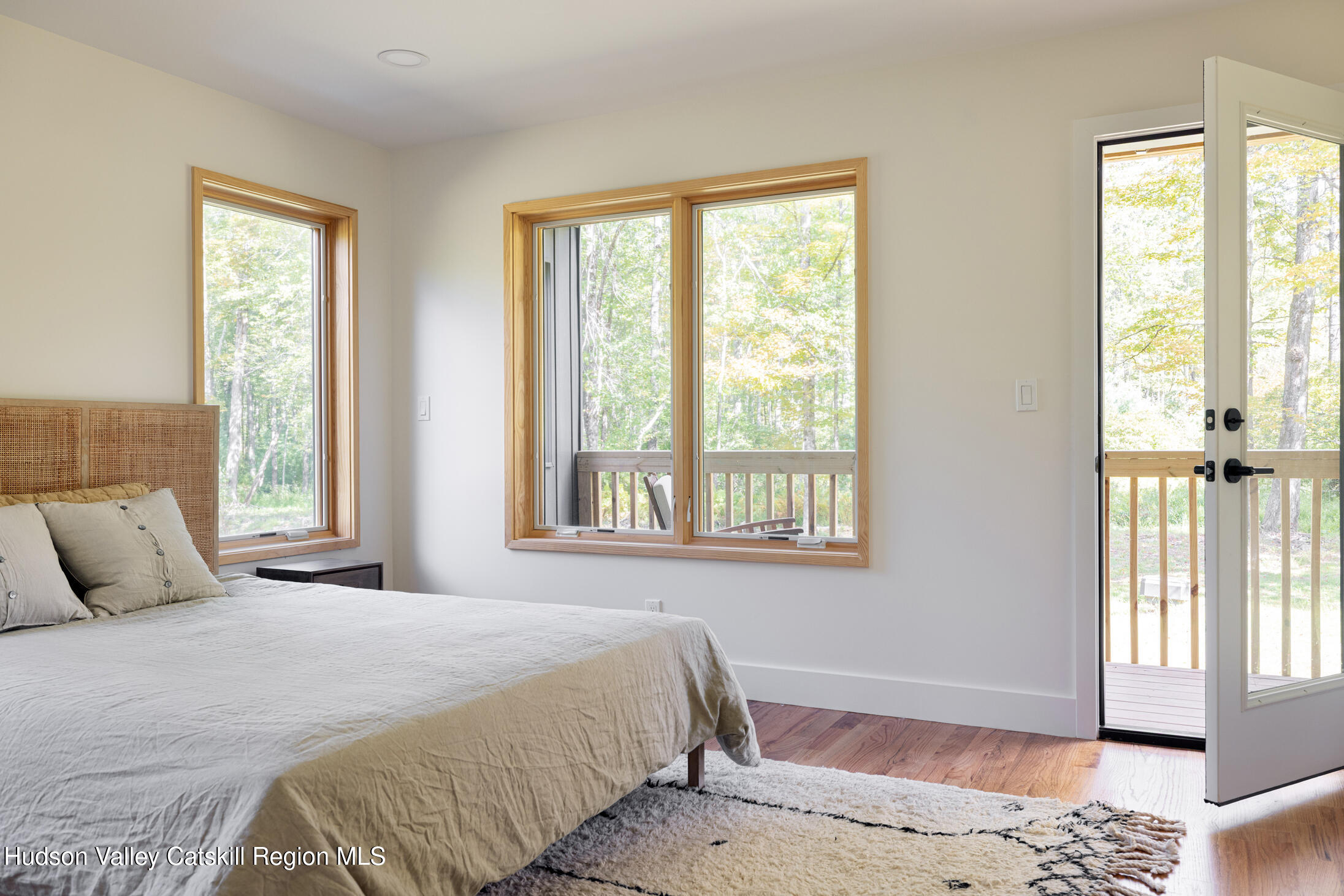 171 Birchall Road Wawarsing, NY 12428 - Photo 16 of 26 a bedroom with a bed and a window