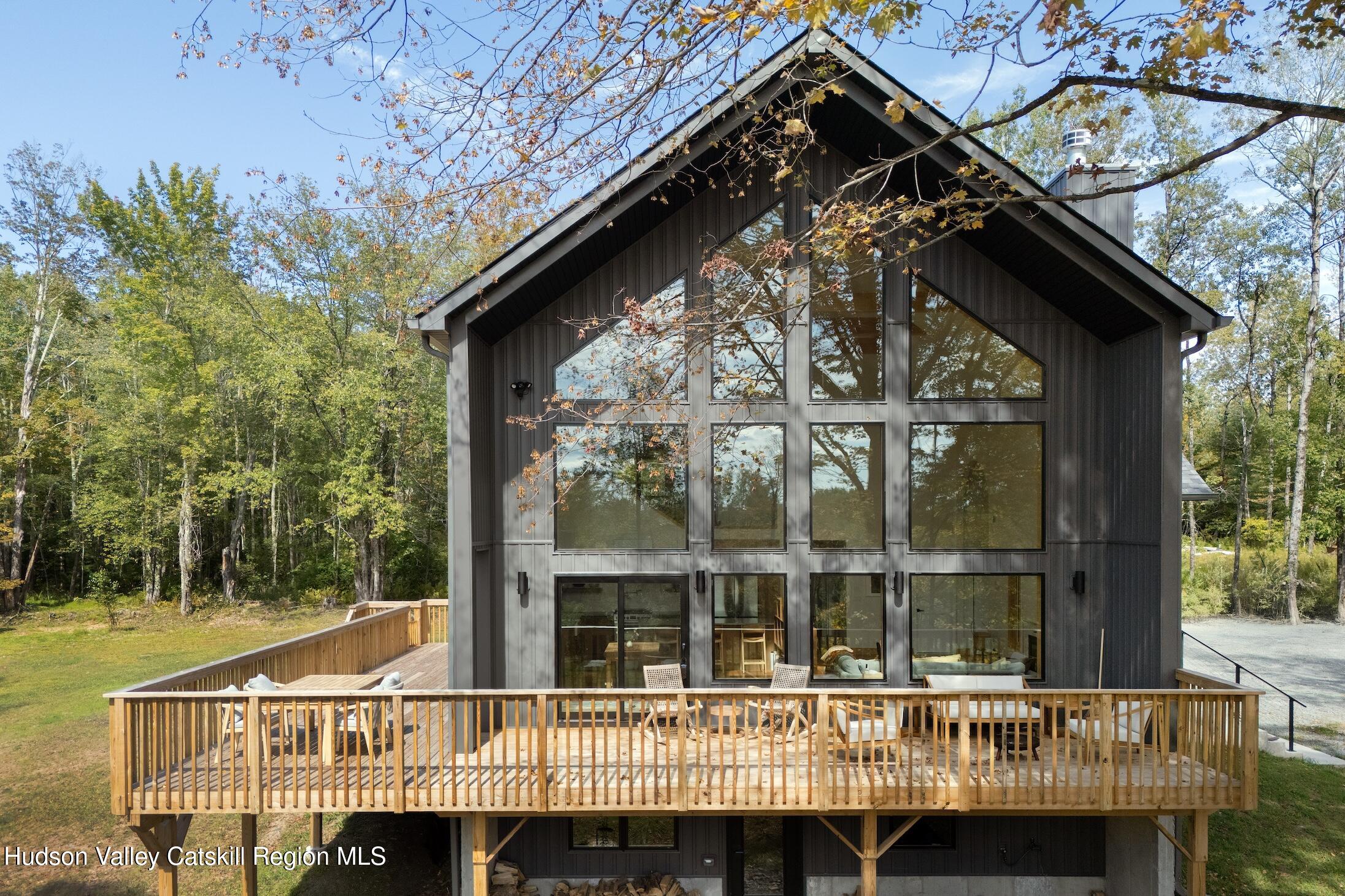 171 Birchall Road Wawarsing, NY 12428 - Photo 2 of 26 a view of a brick house with a large window