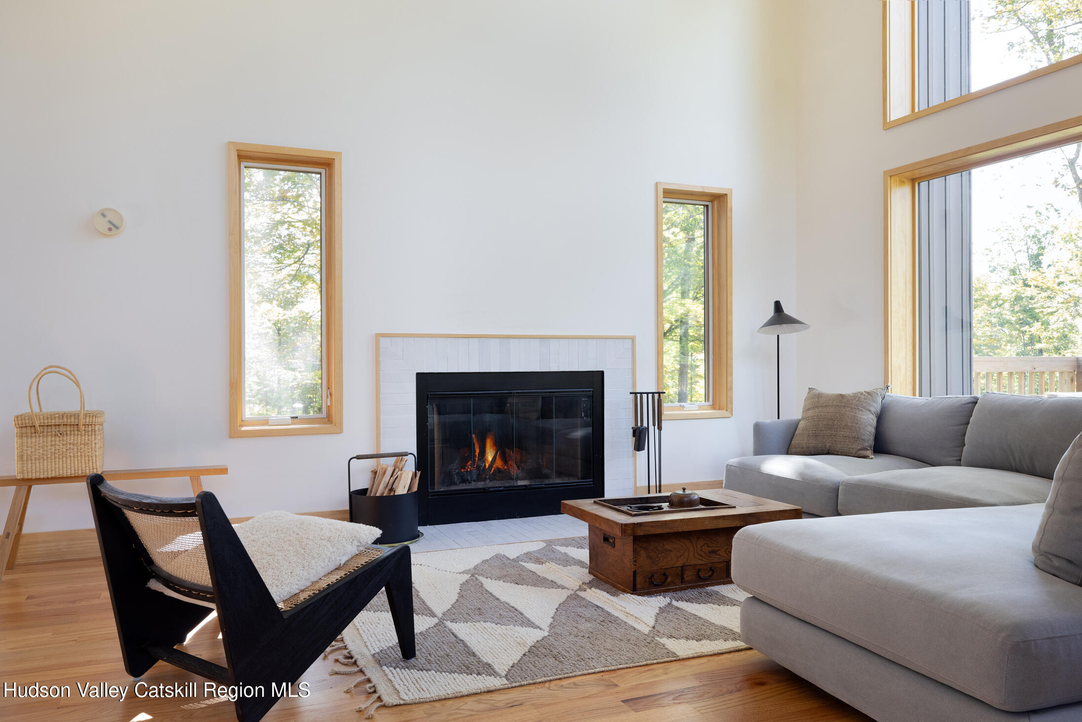 171 Birchall Road Wawarsing, NY 12428 - Photo 7 of 26 a living room with furniture and a fireplace