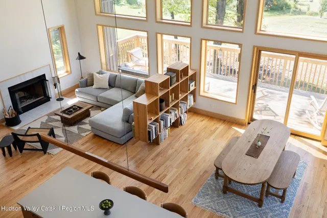 a kitchen with stainless steel appliances a sink a stove and a window
