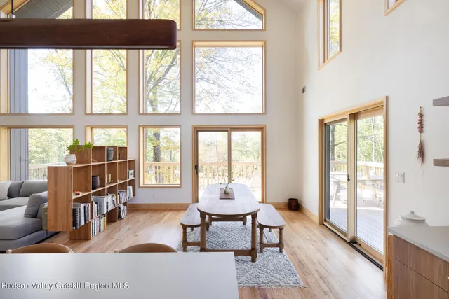 a view of kitchen with furniture and wooden floor