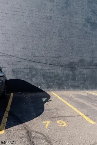 a view of a livingroom with shelves