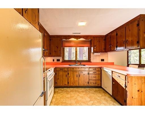 5 Edgebrook Road Framingham, MA 01701 - Photo 17 of 32 a kitchen with stainless steel appliances granite countertop a sink a stove and a refrigerator