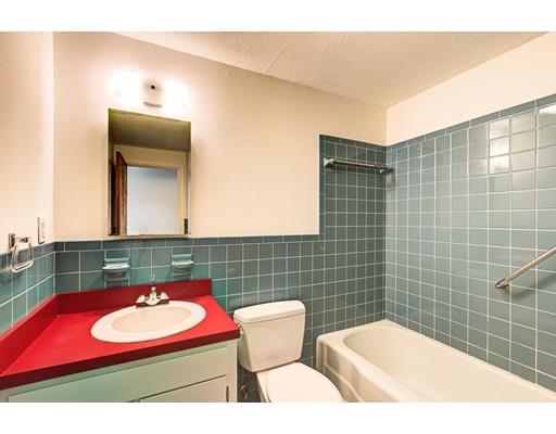 5 Edgebrook Road Framingham, MA 01701 - Photo 31 of 32 a bathroom with a toilet a sink and mirror