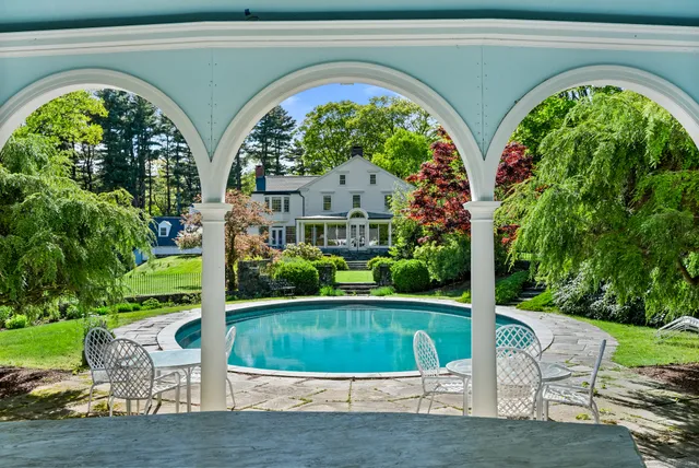 a view of building with garden space