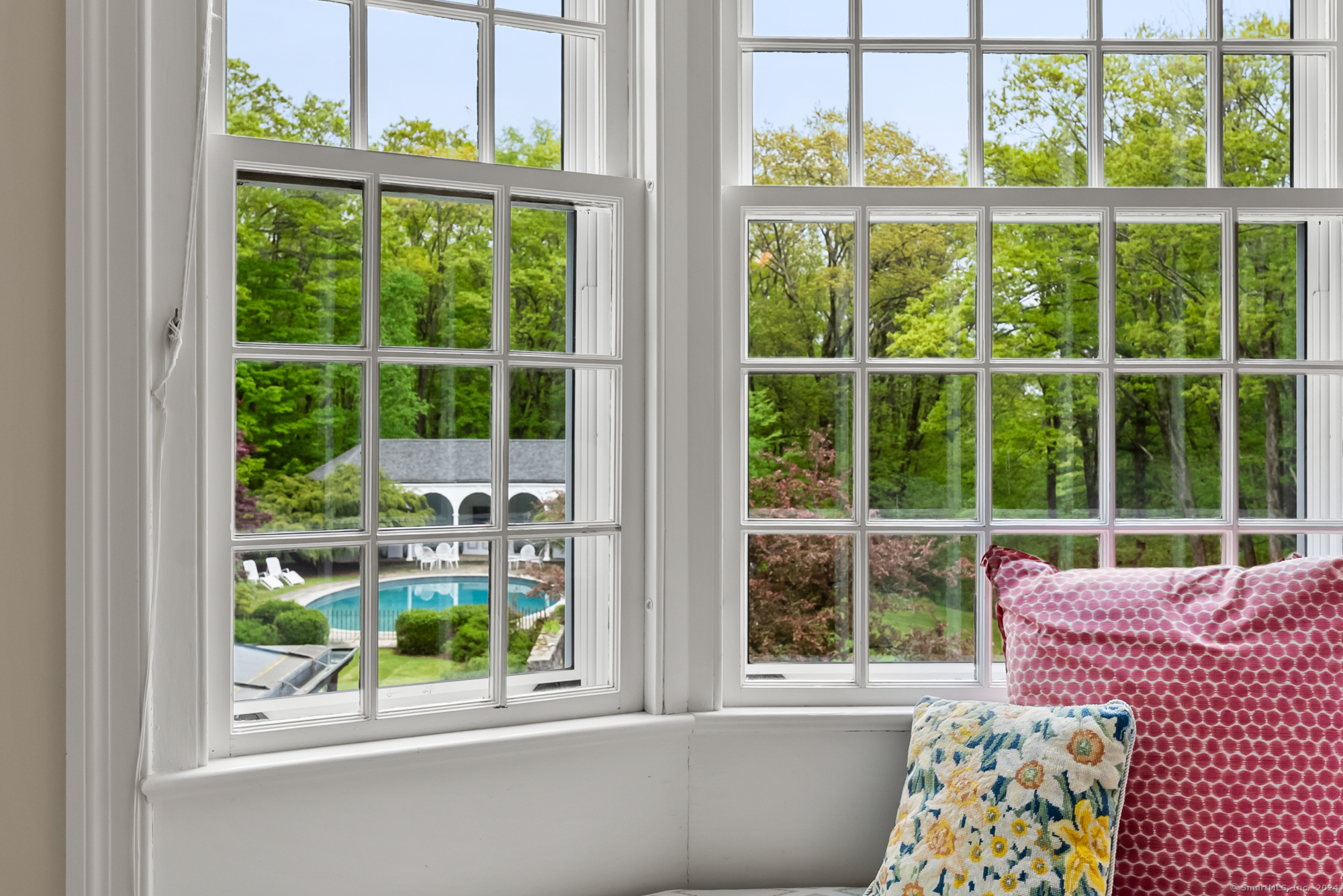 210 Doolittle Drive Norfolk, CT 06058 - Photo 21 of 40 a view of a porch with a dining table and chairs