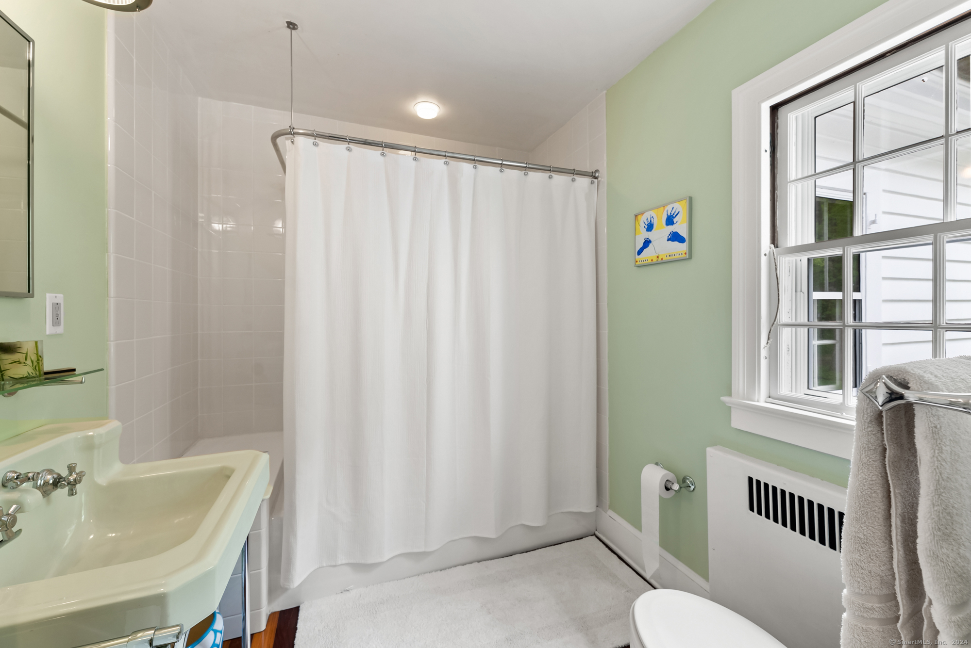 210 Doolittle Drive Norfolk, CT 06058 - Photo 25 of 40 a bathroom with a sink toilet and shower