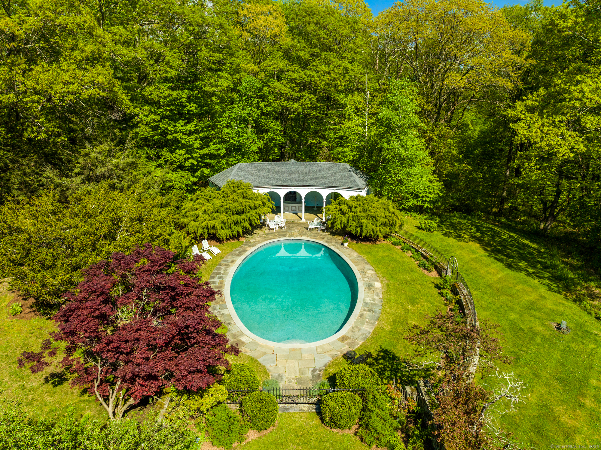 210 Doolittle Drive Norfolk, CT 06058 - Photo 4 of 40 an aerial view of a house with swimming pool and trees