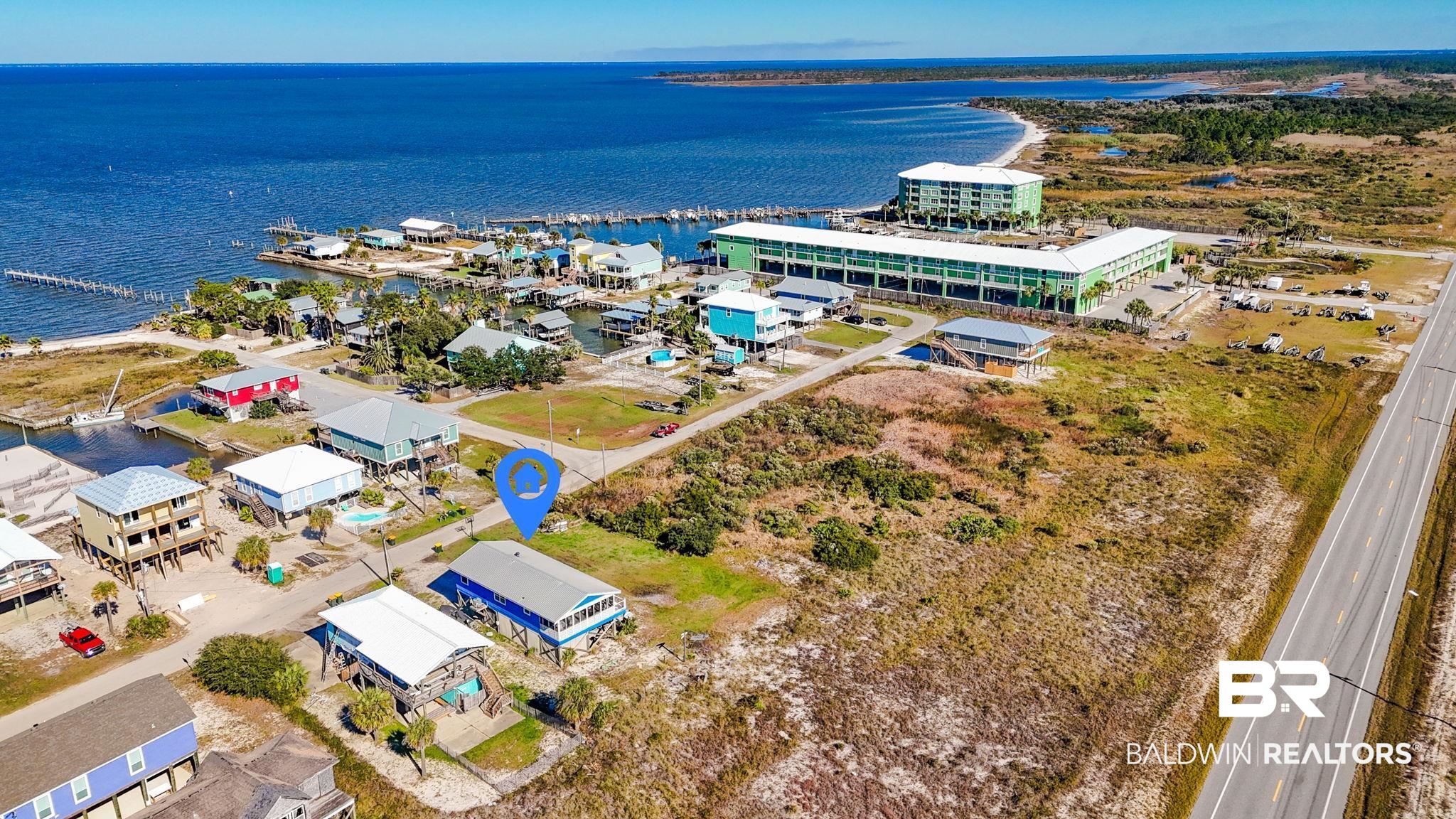 2514 Muscogee Road Gulf Shores, AL 36542 - Photo 4 of 60 Aerial view featuring a water view