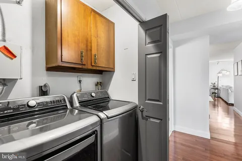 a kitchen with a stove and a refrigerator