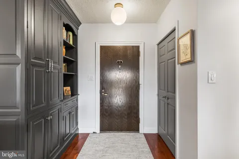 a view of a hallway with front door