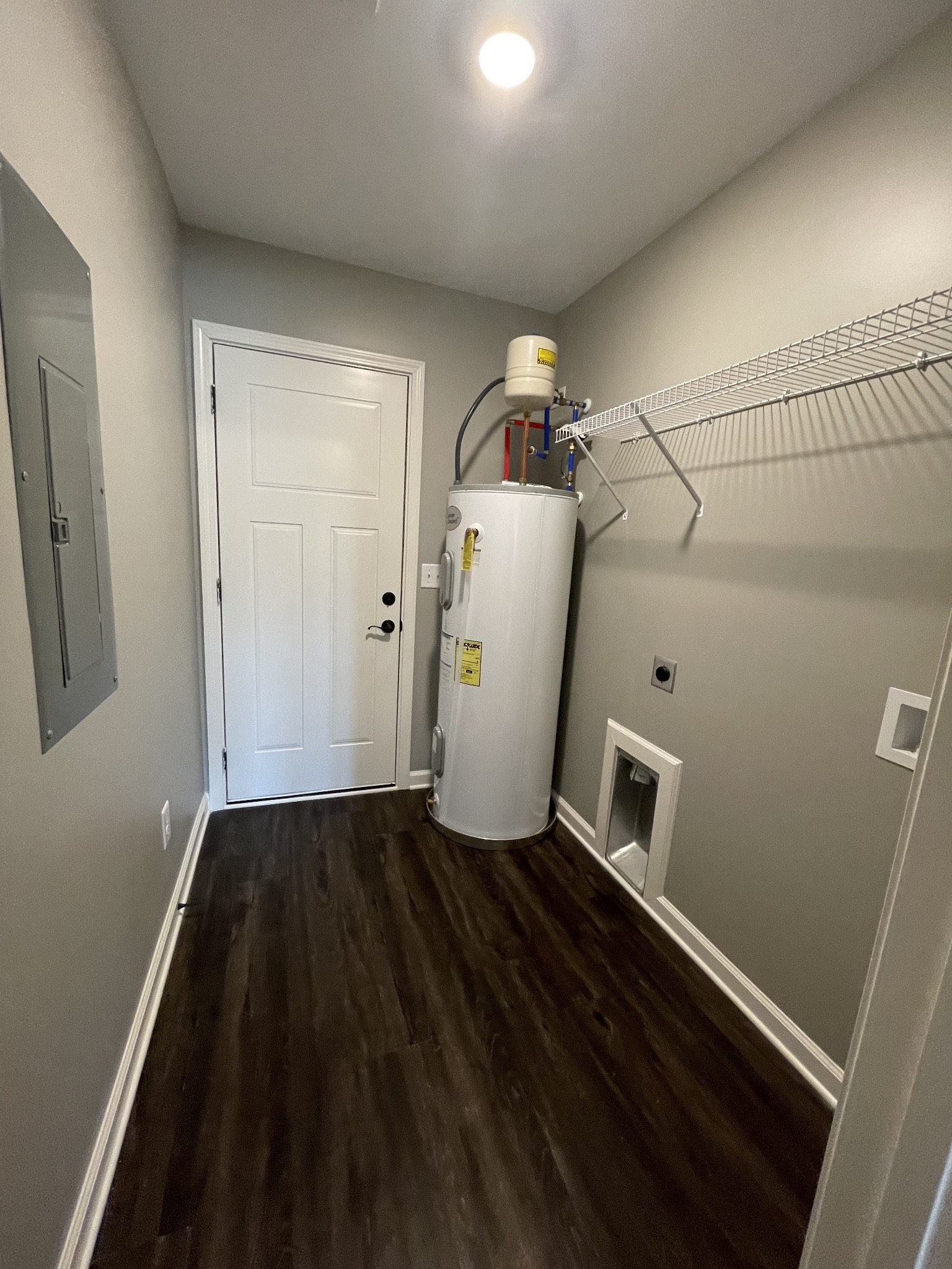 128 Eno Road Dickson, TN 37055 - Photo 12 of 12 a view of an empty room with wooden floor and a window