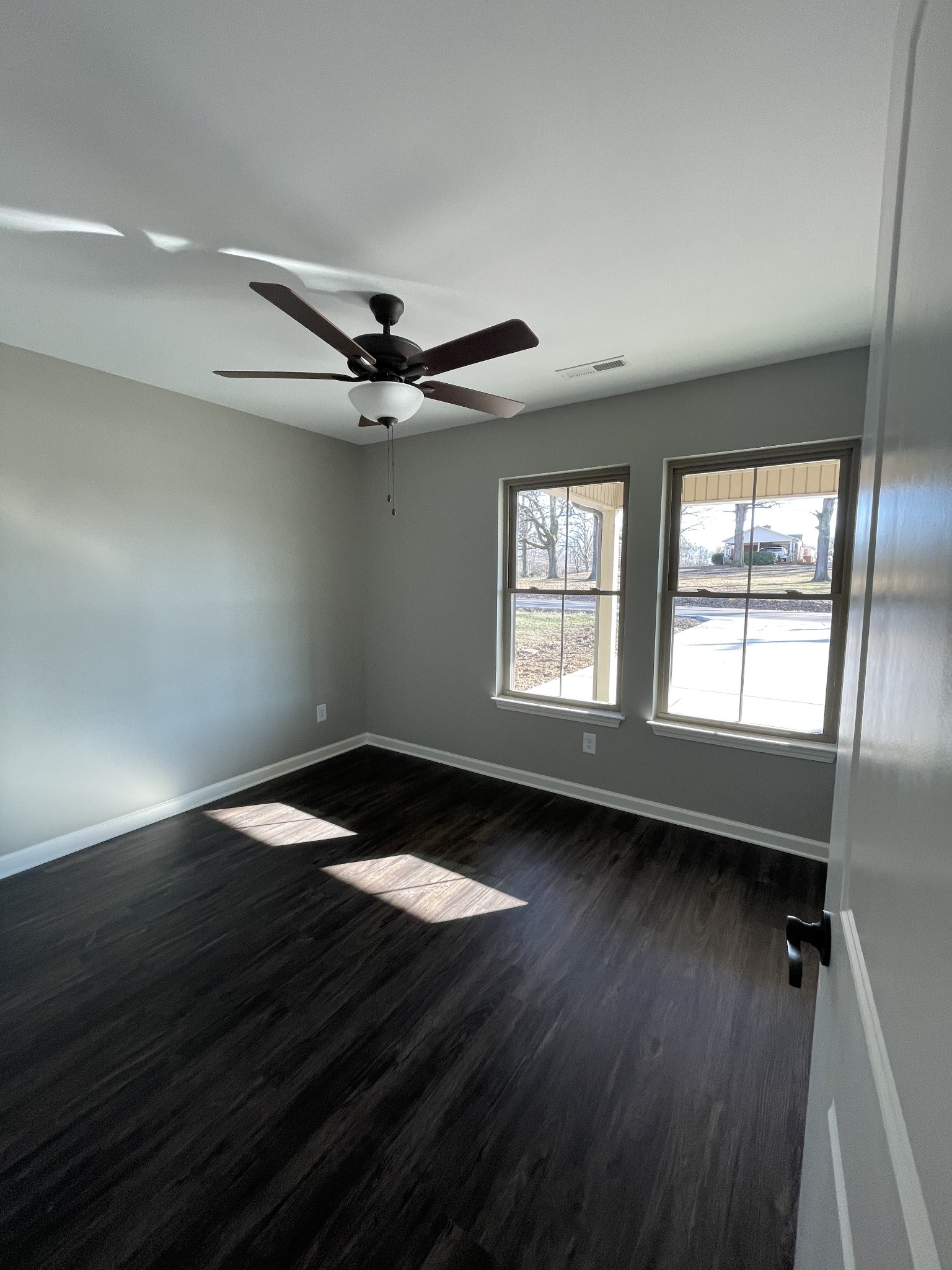 128 Eno Road Dickson, TN 37055 - Photo 8 of 12 wooden floor in an empty room with a window