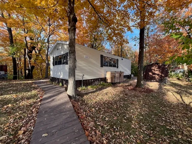 a house view with a backyard space