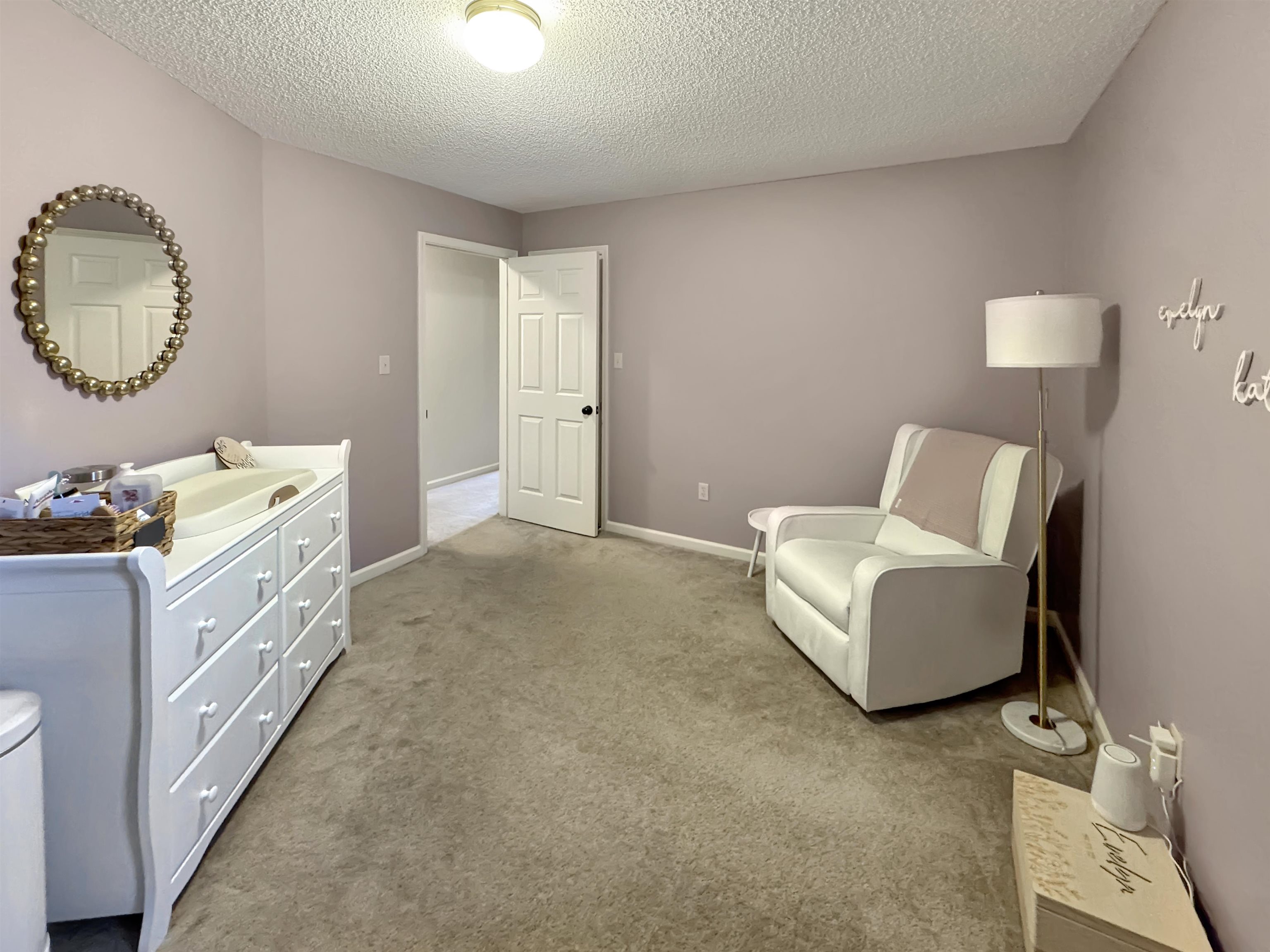 340 Scarlett's Way Collierville, TN 38017 - Photo 29 of 40 Sitting room featuring carpet and a textured ceiling