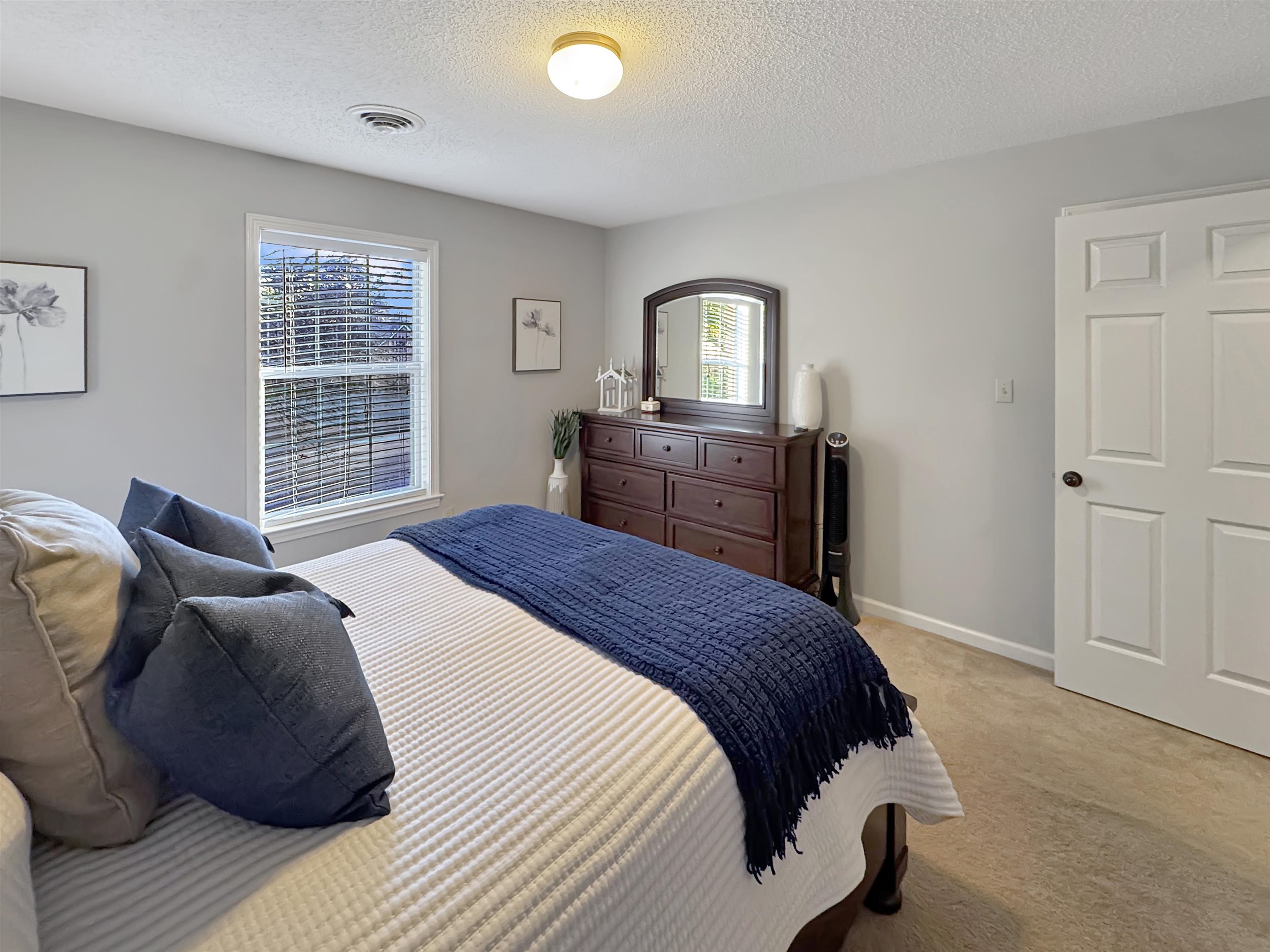 340 Scarlett's Way Collierville, TN 38017 - Photo 32 of 40 Bedroom featuring a textured ceiling and light colored carpet