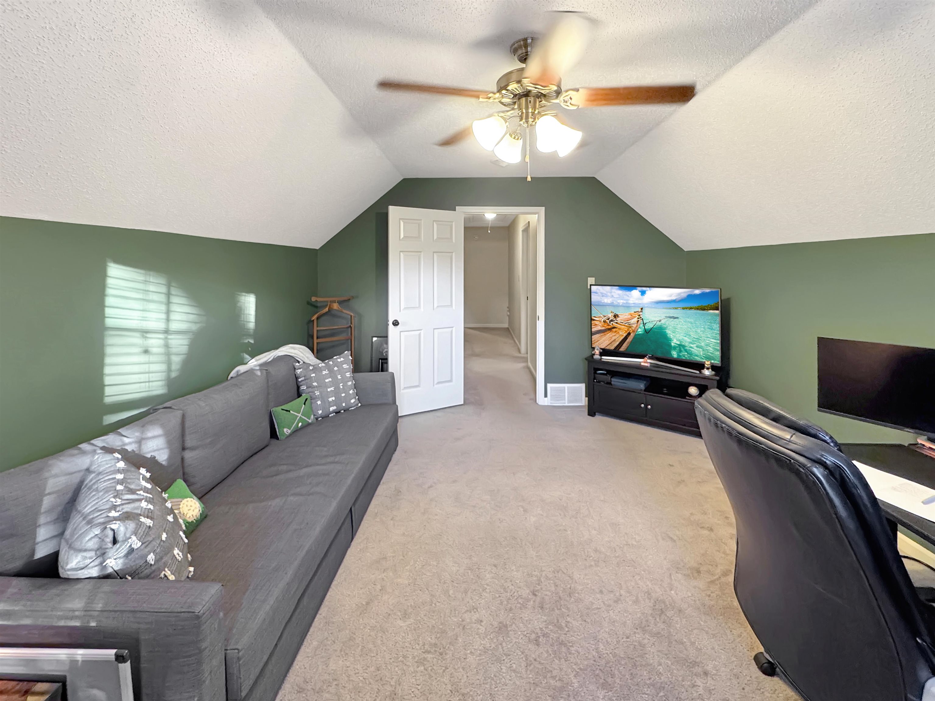 340 Scarlett's Way Collierville, TN 38017 - Photo 35 of 40 Office space featuring a textured ceiling, light colored carpet, vaulted ceiling, and a ceiling fan