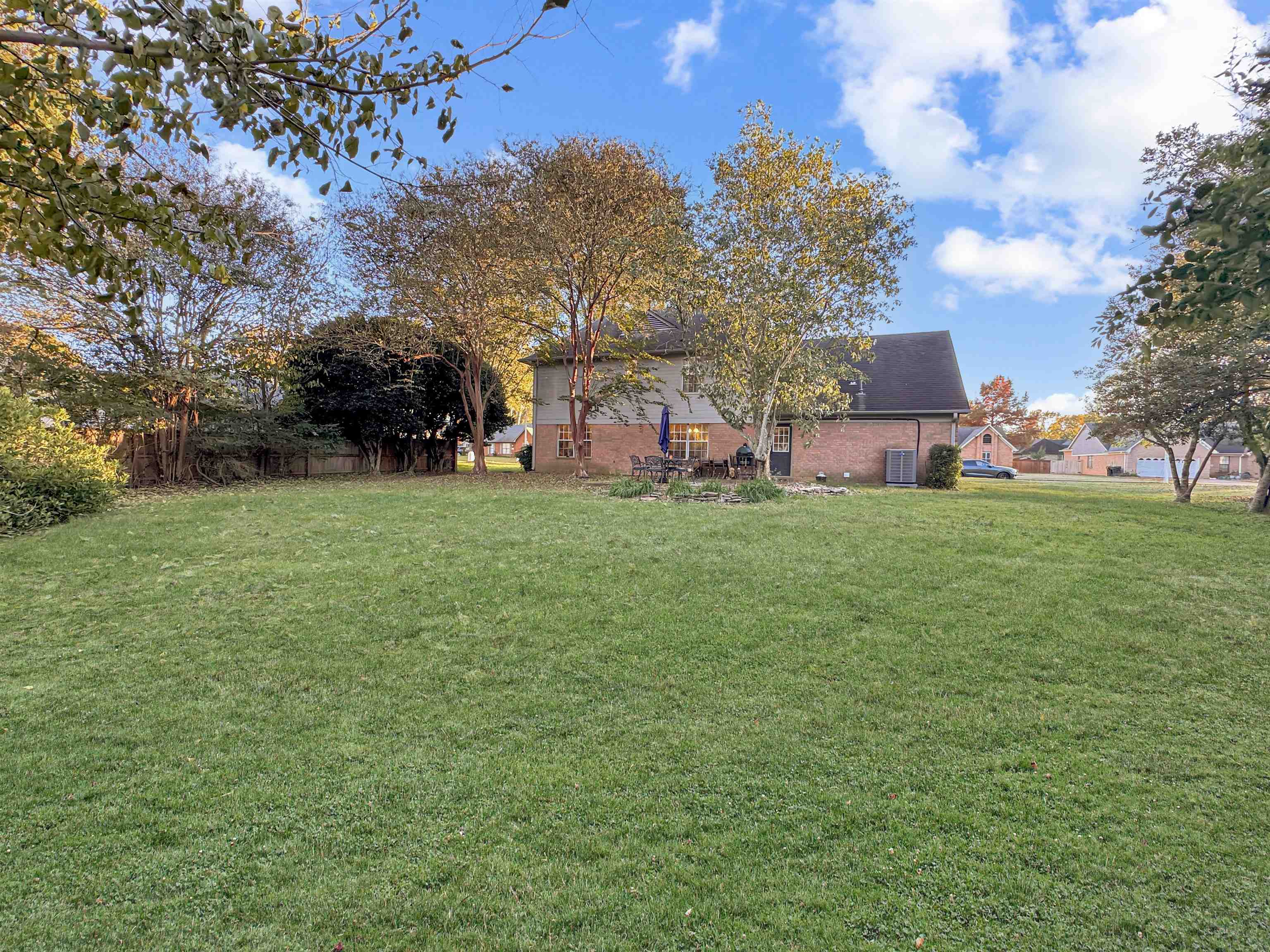 340 Scarlett's Way Collierville, TN 38017 - Photo 40 of 40 View of grassy yard featuring a patio