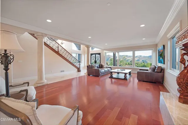a kitchen with lots of counter top space and dining room view