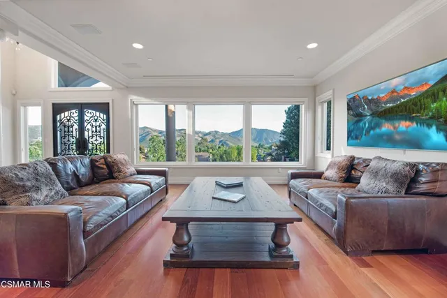 a view of a kitchen counter top space with stainless steel appliances and a kitchen counter top