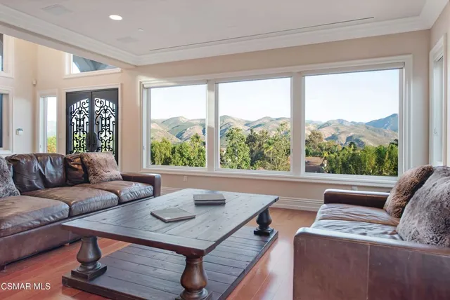 a kitchen with stainless steel appliances granite countertop a stove and a refrigerator