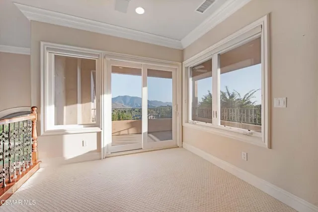 a kitchen with a sink and stainless steel appliances
