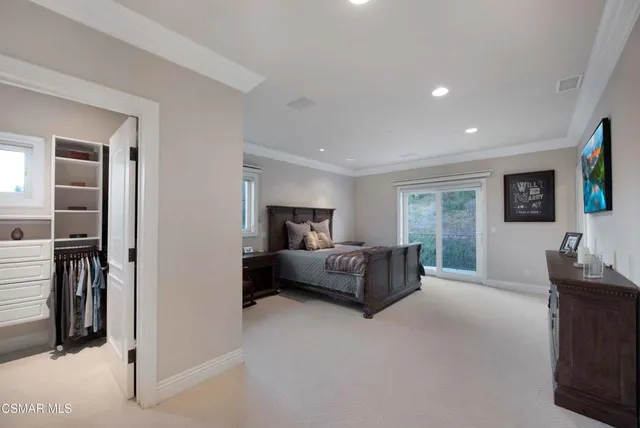 a view of a chairs and tables in the back yard of the house