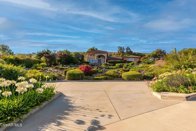 a view of swimming pool with an outdoor space and seating area