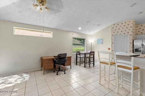 a view of a workspace with furniture