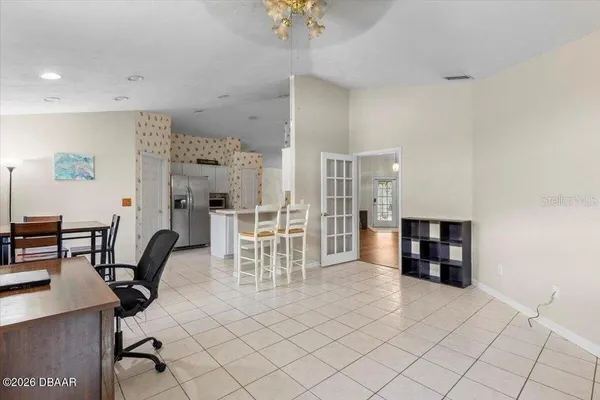 a view of a workspace with furniture