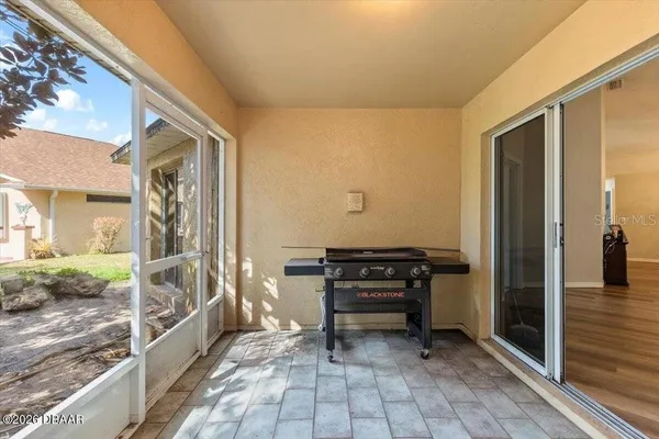 a view of a room with a large window