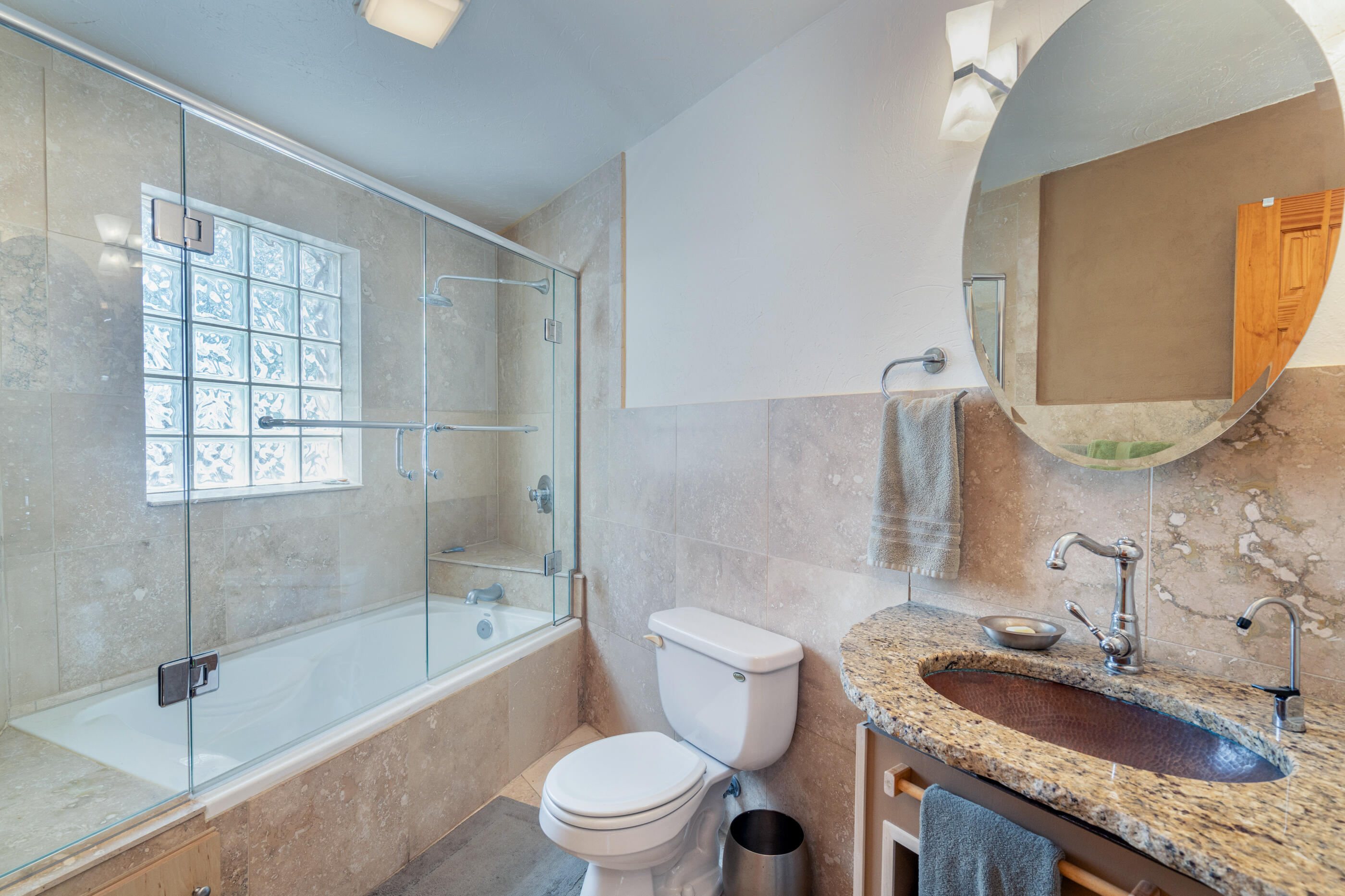 15322 Road 55.9 Rico, CO 81332 - Photo 11 of 32 a bathroom with a granite countertop sink a toilet and shower