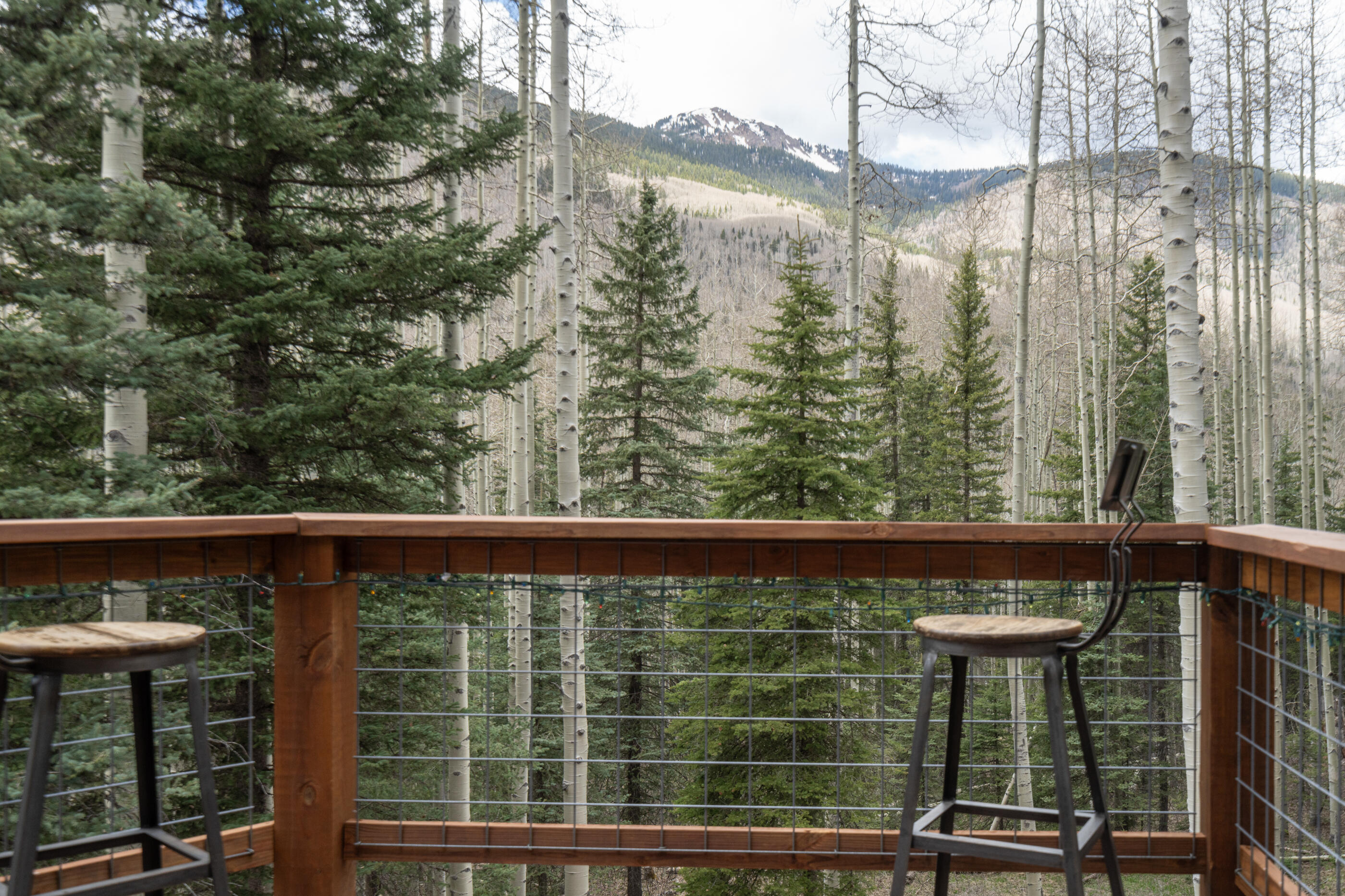 15322 Road 55.9 Rico, CO 81332 - Photo 14 of 32 a view of a chair and table in the balcony
