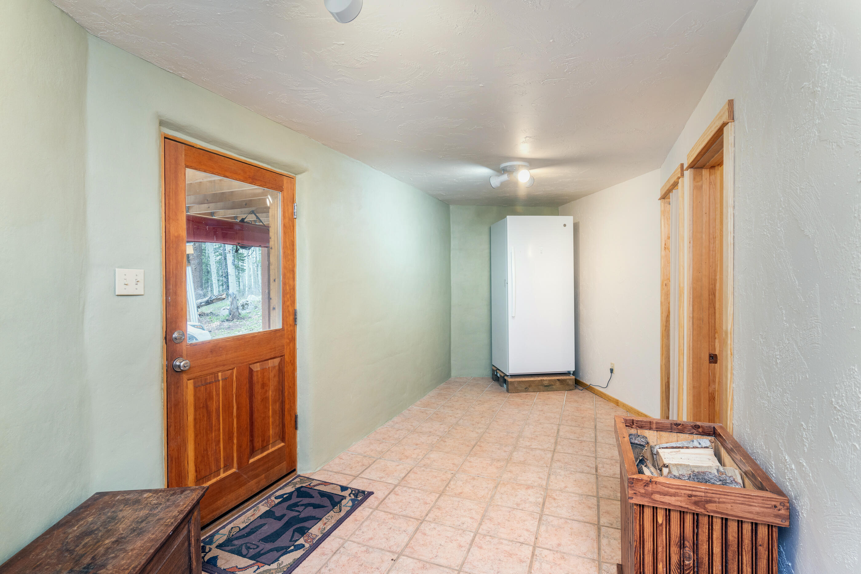 15322 Road 55.9 Rico, CO 81332 - Photo 16 of 32 a view of an empty room and window