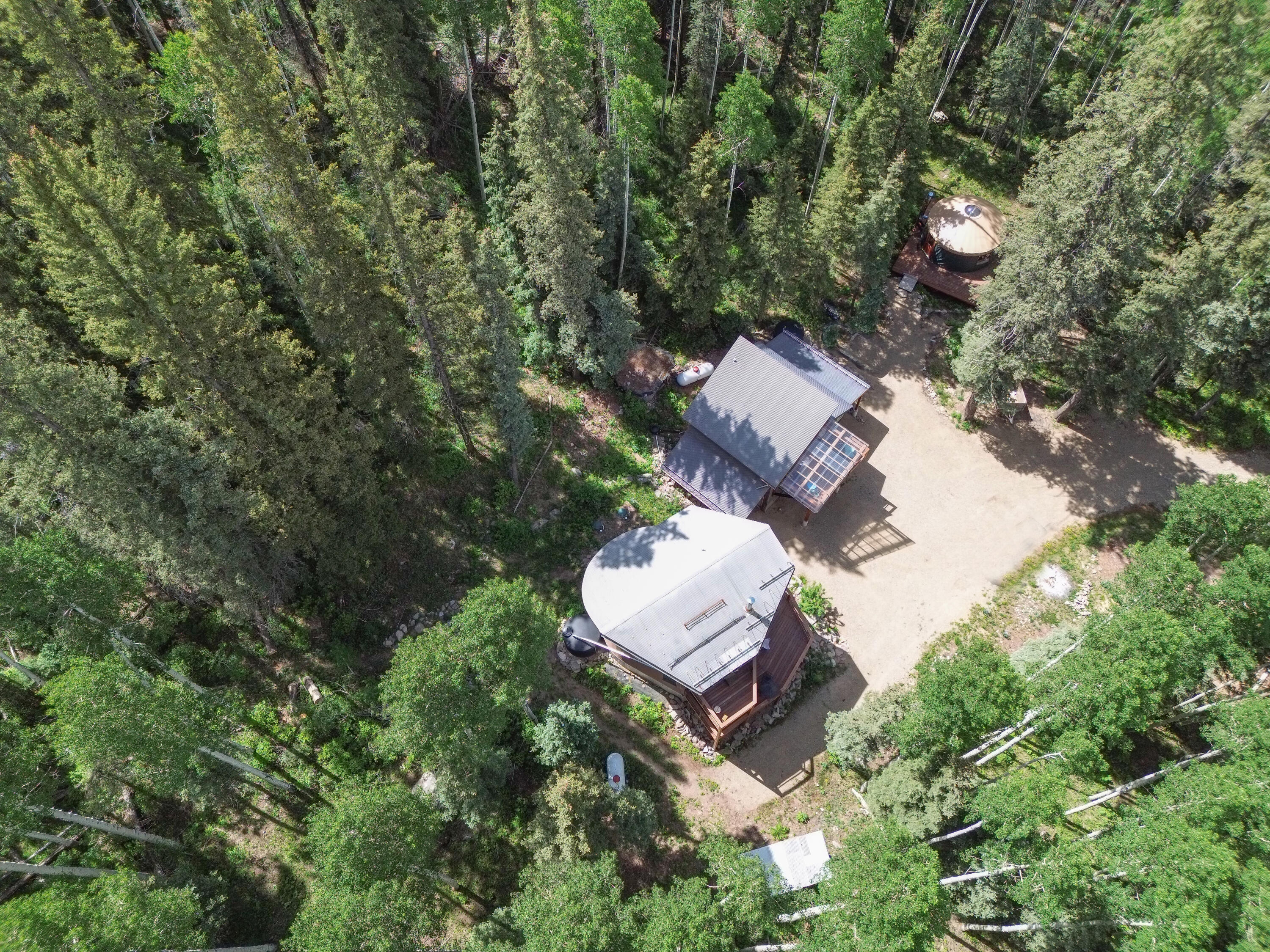 15322 Road 55.9 Rico, CO 81332 - Photo 32 of 32 an aerial view of a house with a yard and lake view