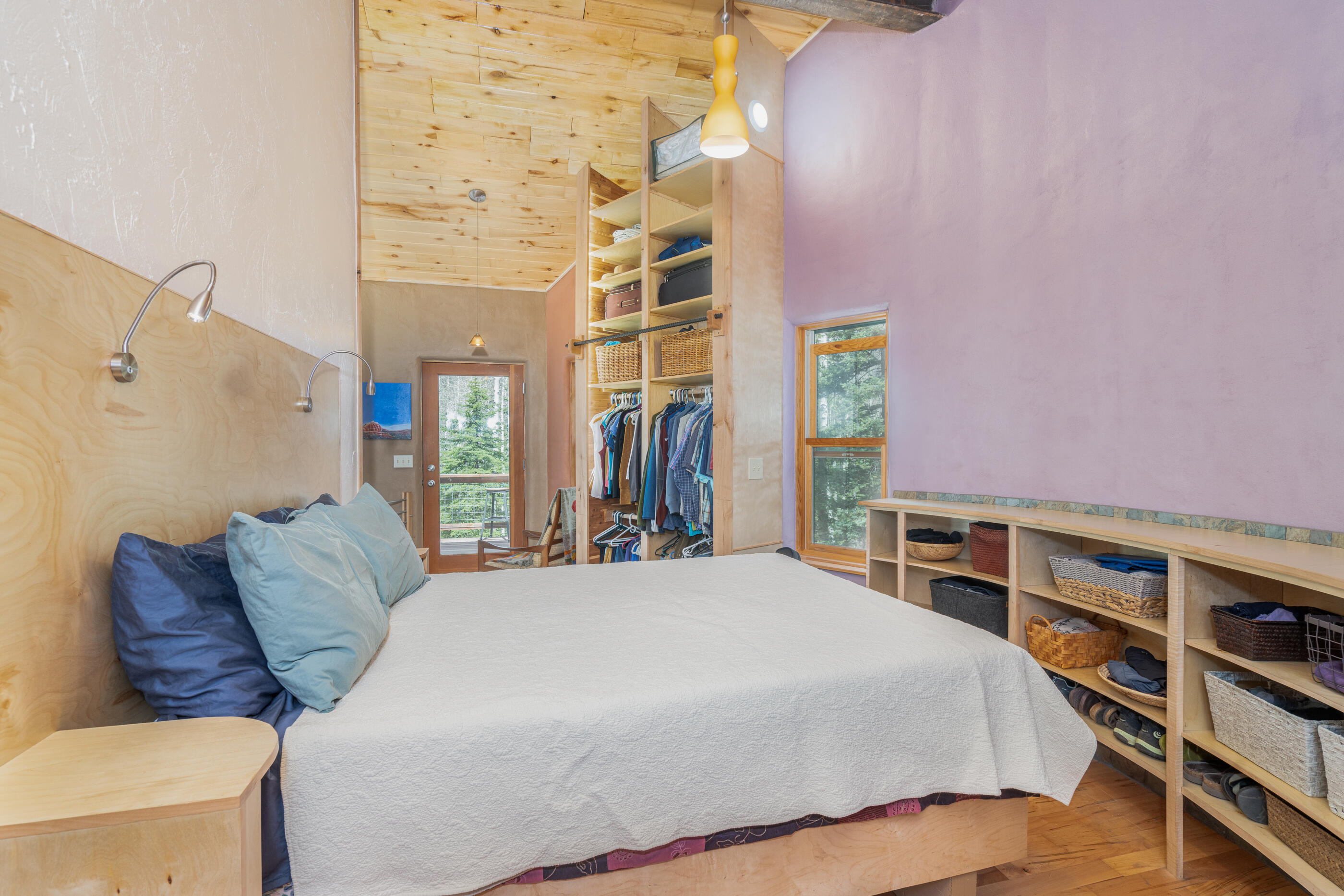 15322 Road 55.9 Rico, CO 81332 - Photo 7 of 32 a large bed sitting in a bedroom next to a cabinet