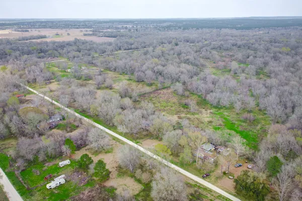 a view of a field with an outdoor space