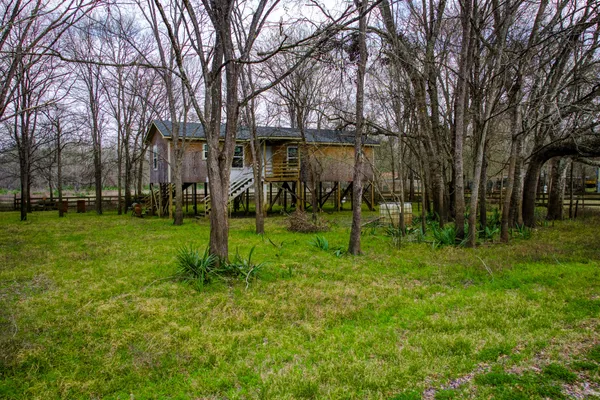 a backyard of a house with entertaining space