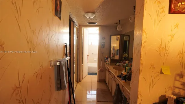 a bathroom with a tub and a shower