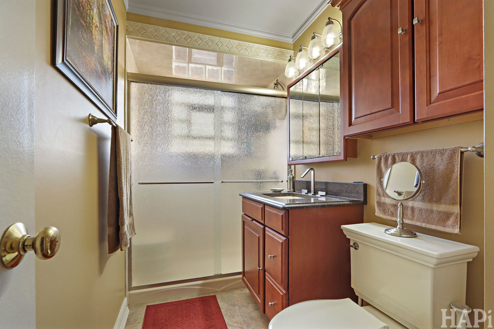 411 West Diversey Avenue Addison, IL 60101 - Photo 11 of 23 a kitchen with a sink a stove and cabinets