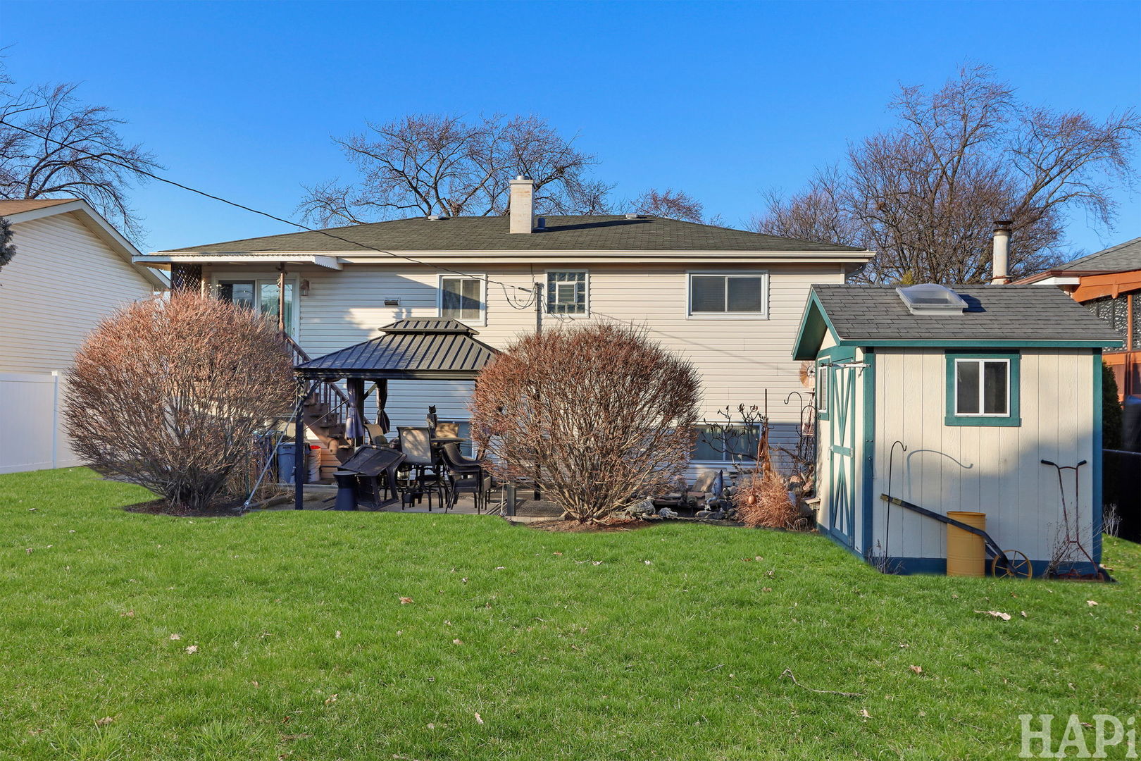 411 West Diversey Avenue Addison, IL 60101 - Photo 20 of 23 front view of a house with a yard
