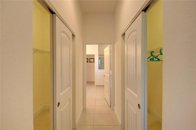 a spacious bathroom with a shower and a sink