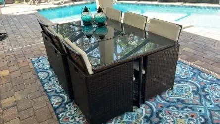 a view of swimming pool with a patio