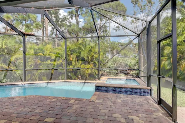 an aerial view of house with yard