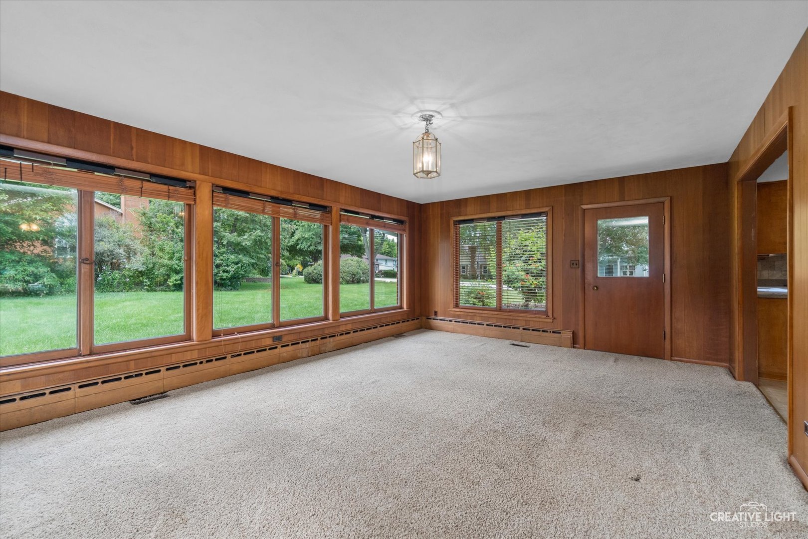 1402 Meadows Road Geneva, IL 60134 - Photo 11 of 30 a view of room with window and ceiling fan