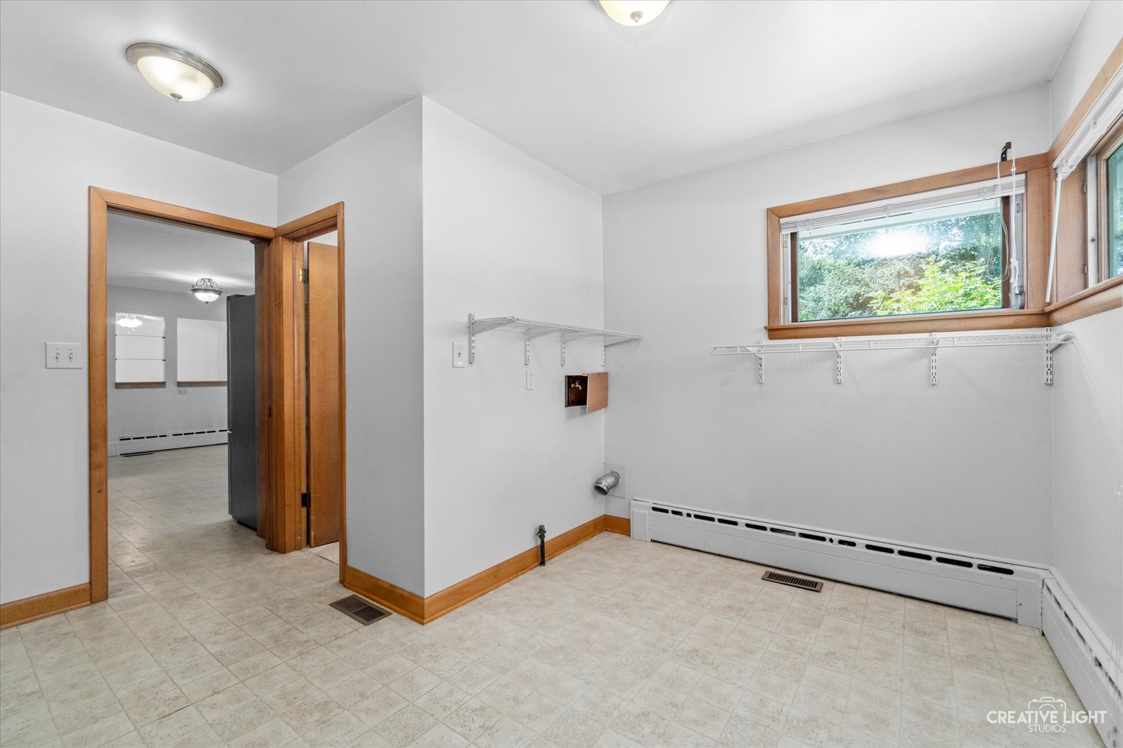 1402 Meadows Road Geneva, IL 60134 - Photo 23 of 30 an empty room with windows